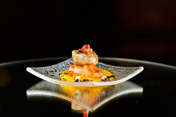 canapés for buffet on a black background
