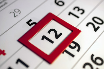 Closeup of dates on calendar page 
