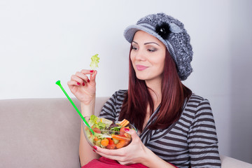 Girl having a salad 