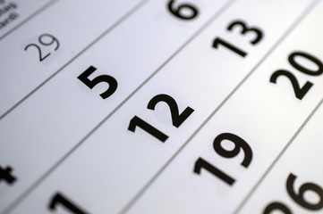 Closeup of dates on calendar page