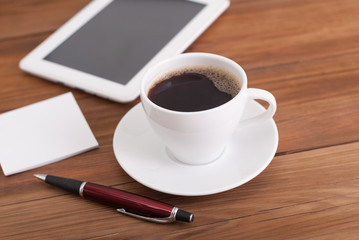 Fototapeta na wymiar Coffee tablet of paper on the table.