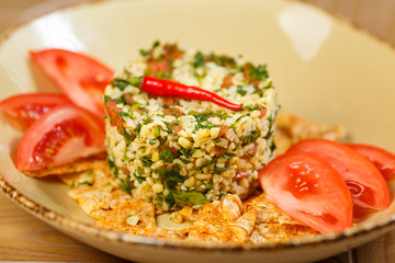 Beautiful meat dish on a wooden background