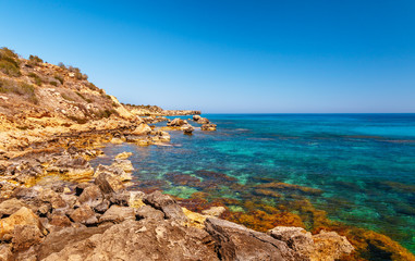 Fototapeta premium Beautiful panoramic sea view on Ayia Napa near of Cavo Greco, Cyprus island, Mediterranean Sea. Amazing blue green sea and sunny day.