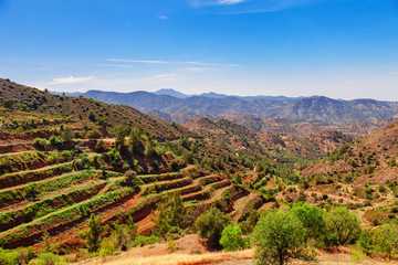 Fototapeta na wymiar Panoramic view near of Kato Lefkara - is the most famous village in the Troodos Mountains. Limassol district, Cyprus, Mediterranean Sea. Mountain landscape and sunny day.