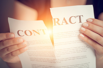 businesswoman tearing contract. Conflict in business.
