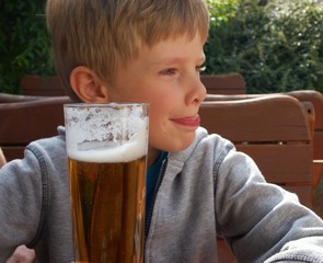 Little boy and non-alkoholic beer