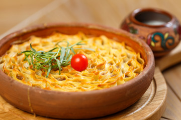 Baking and patties on a wooden background