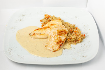 A beautiful meat dish on a white background