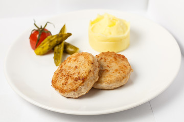 A beautiful meat dish on a white background