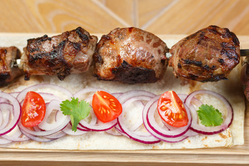 Beautiful meat dish on a wooden background