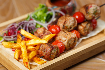 Beautiful meat dish on a wooden background