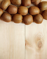 Fresh Kiwi Fruits on an old wooden table