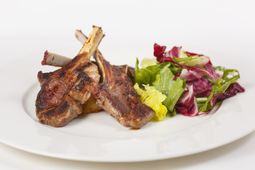 A beautiful meat dish on a white background
