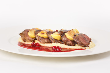 Roasted meat with vegetables on the table