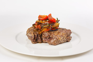 Roasted meat with vegetables on the table