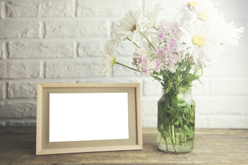 photo frame and flowers