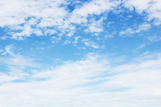 Fantastic soft white clouds against blue sky background, soft fo