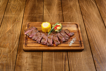 Beautiful meat dish on a wooden background