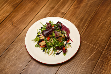 Beautiful meat dish on a wooden background