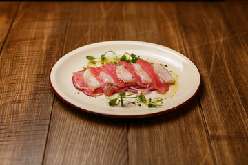 Beautiful meat dish on a wooden background