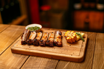 Ribs on the grill with potatoes

