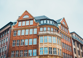 Fototapeta premium Urban apartment building with mixed exterior types