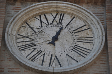 Fototapeta na wymiar Old bell tower clock, Monterinaldo, Italy