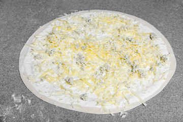 Pizza prepared for cooking