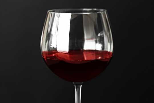 Red wine on dark background