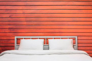 Bedroom with wooden wall