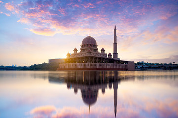 Naklejka premium Putra mosque during sunrise with reflection, Malaysia