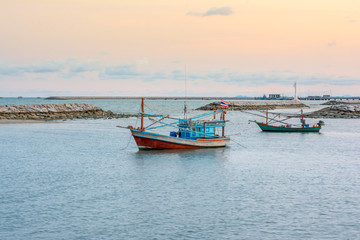 Fishing boat in the sea Ao Klong wal beach at Prachuap Khiri Khan province, Thailand