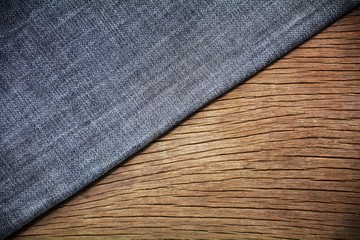 wood background on blue jeans texture