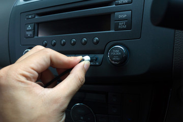 man hand use the signal switch. Car interior detail