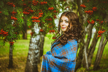 the girl in the blanket on the street