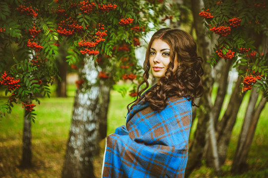 the girl in the blanket on the street