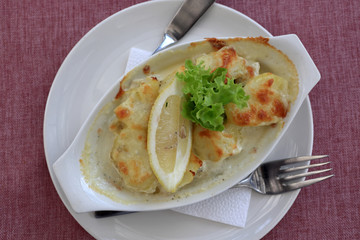 Plate with baked parmesan perch