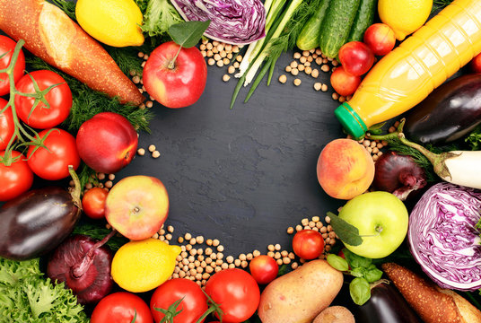 Frame of colorful fruits and vegetables background