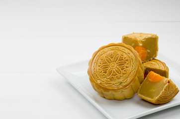 Chinese moon cake on white plate and white background