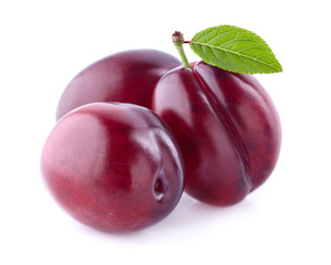 Red plums with leaf