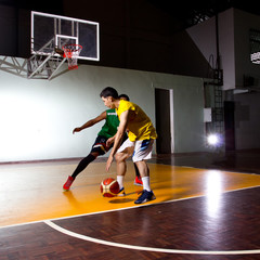.Two Basketball player playing