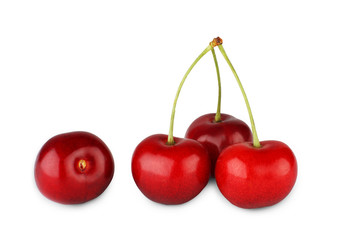 Fresh ripe cherries closeup isolated on white background