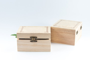 Small Wooden box closed isolated on white background.