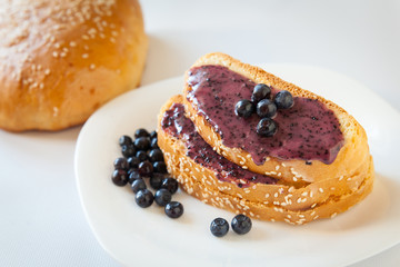 Sandwiches with cream honey and blueberries