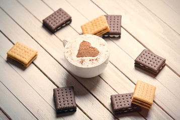 cup of coffee and cookies