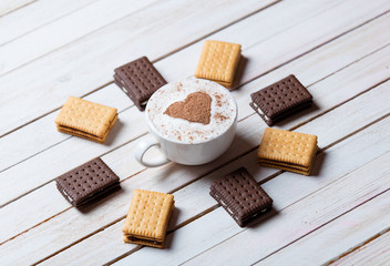 cup of coffee and cookies