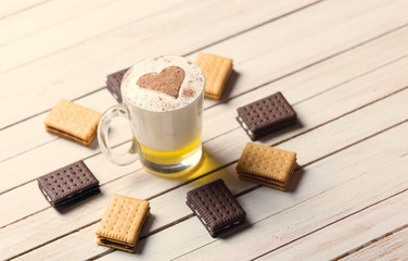 cup of coffee and cookies