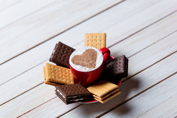 cup of coffee and cookies