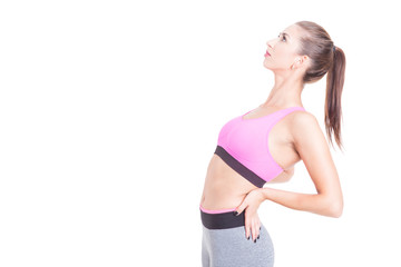 Female trainer stretching her back preparing for workout