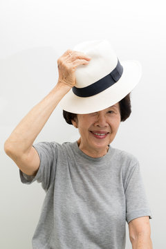 old women wear hat  smailling ,asian people, asian women